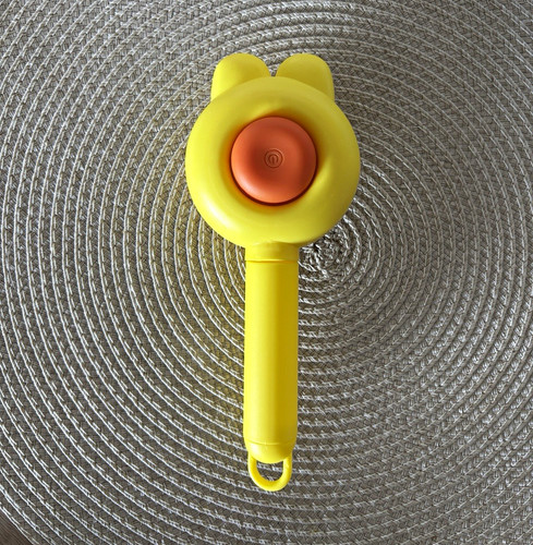 Handheld yellow orange pet - &,